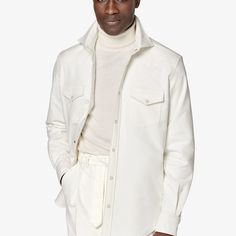 A collection standout with some definitive American flair, this western-style off-white shirt is tailored slim with a stitched-on placket, pointed flap pockets, snap buttons, and classic collar-perfect on its own or layered over a t-shirt for an effortless casual style. Fitted Collared Shirt With Flap Pockets, White Button Closure Shirt For Fall, Casual White Outerwear With Spread Collar, White Shirt With Button Closure For Winter, White Button-up Outerwear With Welt Pockets, Classic Fitted Tops With Flap Pockets, White Lapel Collar Top For Winter, Classic Fitted Top With Flap Pockets, White Cotton Tops With Flap Pockets