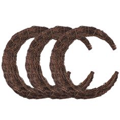 three pieces of brown wicker sitting on top of each other