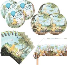 winnie the pooh birthday party supplies including plates, napkins and tablecloths