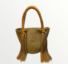 "Wayuu Rapunzel Jeyjei Mochila Bag - 100% Genuine Lightweight and colorful, this bag is great to bring to beaches and pools for the summer. This is the perfect carry-all for your next coastal vacation or night out. It is a versatile bag that will complement your everyday outfit. Its size is ideal to carry all of your essentials. Product Info - Can be folded and very easy to wash. - Measurements Large size : Height: 10\" Width:13\" Diameter:8\" Shoulder drop:18\" This bag is handmade. Sizes, shad Vacation Hobo Bag In Beige Bucket Style, Vacation Beige Bucket Hobo Bag, Beige Bucket Hobo Bag For Beach, Spacious Double Handle Hobo Bag For Beach, Eco-friendly Hobo Bag With Adjustable Strap For Vacation, Beach Hobo Bag With Double Handles, Beach Bucket Hobo Bag With Adjustable Strap, Trendy Bucket Hobo Bag For Vacation, Beach Season Shopping Tote Hobo Bag