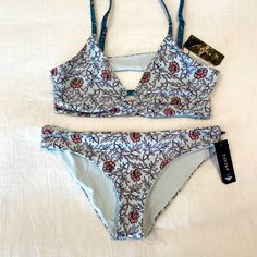 Nwt Tavik Juliet Wildflower Print Bikini Size L. This Bikini Is Such A Staple For The Pool, The Beach, Or A Night Spent In The Jacuzzi. Fitted Floral Print Swimwear With Triangle Top, Floral Print Fitted Tankini With Triangle Top, Fitted Floral Print Triangle Top Swimwear, Fitted Floral Print Triangle Top Tankini, Wildflower Print, The Pool, Womens Swim, Wild Flowers, The Beach