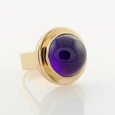 Brazilian Amethyst's deep purple color has always been one of my favorite choices when it comes to these hues.  The richness and liveliness always stimulates an inspiration to create something unique and different.  Well, here is a ring that I feel meets that criteria.  This hand cut  15 mm Round Cabochon demands everything that follows must be suited to this singular piece. I guess that's what spurs inspiration on and on.  In ancient times, the legend was that Amethyst prevented intoxication an Deep Purple Color, Rich Purple, Cabochon Ring, February Birth Stone, Jewelry Packaging, Amethyst Ring, Purple Amethyst, Deep Purple, Statement Ring