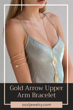 A chic upper arm cuff bracelet, with arrow ends, in brushed gold you can wear for a classy boho look . Although the reference is a primitive motif, the outcome is sleek, minimal and elegant. Upper Arm Cuff, Gold Arm Band, Upper Arm Cuffs, Boho Cuff Bracelet