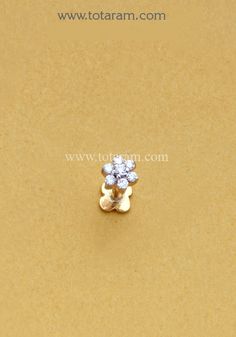 18 Karat Gold Diamond Nose Pin 
   - 235-NP023 - in 0.400 Grams for USD $171.55. 
Made in India by Totaram Jewelers Online this product is in Gold - 18 Karat Gold  & is an excellent gift for Adult - Women. Ships fully insured with secured guaranteed delivery for free with your order over $250 from New Jersey USA & comes with 30 days exchange policy. Yellow Gold Round Nose Studs With Prong Setting, Yellow Gold Nose Studs With Prong Setting, Yellow Gold Prong Set Round Nose Studs, Diamond Nose Studs With Prong Setting, Elegant Yellow Gold Nose Studs With Prong Setting, Elegant Nose Studs For Anniversary, Elegant Round Nose Studs For Anniversary, Diamond Nose Rings For Anniversary, Elegant 14k Yellow Gold Nose Rings