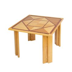 a small wooden table with geometric designs on it