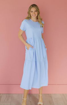 A customer's favorite Tee Dress is back in NEW colors for Spring/Summer! Our Kelsey is made for the runs to the grocery store, date night, vacations, cover ups for swimsuits, & so much more! A versatile style that can be dressed up or down. Additions include pockets, high end fabric that does not pill, or fade with wear! Product Fit + Details: High quality T-shirt fabric Round neckline Pockets True to size Loose comfortable fit Flowy fabric Tiered skirt Available in Periwinkle, & Mauve Mist, Bri Periwinkle Dress, Colors For Spring, Flowy Fabric, Fit Details, Cover Ups, Shirt Fabric, Swimsuit Fashion, Tier Skirt, High Quality T Shirts