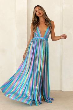 Length from bust to hem of size S: 117cm. 
 Maxi dress. 
 Semi-lined. 
 Model is a standard S and is wearing S. 
 True to size. 
 Non-stretch fabric. 
 V neck. 
 Flowy skirt. 
 Crisscross. 
 Zipper. 
 Cold hand wash only. 
 Polyester. 
 
 Magical vibes are yours in the Your Muse Maxi Dress. Featuring a V-neck and a gorgeous flowy skirt. Style with curls and heels for all the likes. Sorority Dresses, Cute Prom Dresses, Rainbow Dress, Skirt Style, Long Sleeve Lace Dress, Dresses Backless, Flowy Skirt, Dream Dress, Sequin Dress