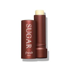 A cult-favorite hydrating and smoothing lip balm that offers clear, sheer, or effortless color with long-lasting moisture and essential sun protection Sugar Lip Balm, Beet Root, Hydrating Lip Balm, Sugar Lips, Natural Lip Balm, Sugar Cane, Spf Sunscreen, Spf 15, Grapeseed Oil