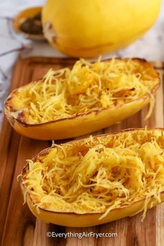 spaghetti dish in the shape of squash on a cutting board