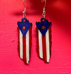 Puerto Rican Flag hand painted on wood shaped as the island. Super light weight, great for traveling. Hypoallergenic (lead and nickel free) earrings silver or gold color available. Show your pride or support for Puerto Rico. If you would like another nations flag please message me and I can let you know if its something I can do. Puerto Rican Flag, Wood Dangle Earrings, Porto Rico, Nickel Free Earrings, Free Earrings, Puerto Rican, Earrings Silver, Painting On Wood, Puerto Rico