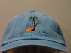 NEW EMBROIDERED PALM TREE SUNSET OCEAN WILDLIFE BASEBALL HAT (HATS PICTURED ARE CARIBBEAN BLUE, NAVY BLUE, KHAKI, WHITE, BURGUNDY AND CHARCOAL) Adams Optimum 6 Panel Baseball Hat Low Profile - 100% Cotton Twill Adult Cap Pigment Dyed - Garment Washed Hat 6 Panels with Sewn Matching Eyelet Visor with 3 Rows of Stitching Pre-formed Bill - Leather Strap with Brass Grommet Adjustable - One Size Fits Most An Extremely Comfortable Baseball Hat! Enjoy the Embroidered Palm Tree Sunset Ocean Wildlife Hat Adjustable Beach Baseball Cap With Embroidered Logo, Casual Beach Hats With Embroidered Logo, Summer Snapback Baseball Cap With Custom Embroidery, Casual Embroidered Baseball Cap For Beach, Casual Beach Hat With Embroidered Logo, Six-panel Baseball Cap For Beach And Summer, Casual Vacation Hats With Embroidered Logo, Casual Embroidered Hats For The Beach, Casual Embroidered Beach Hats