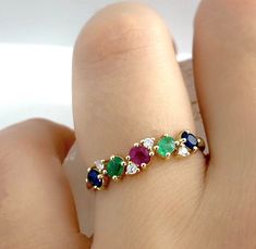 COLORFUL STONES RING - Tiny Blue Gemstone Ring Band - Gf Birthday Gift - Woman Gemstone Ring - Solid Gold Jewelry *100% natural gemstone *100% natural diamonds *14k solid gold *solid gold (NOT plated) *gemstones: ruby-emerald-sapphire *gemstone: diamond *stones shape : oval *stone shape diamond: round *stone gemstones : 2x3 mm. *stone gemstones ct. : 0.54-0.65 ct. *stones ruby : 1 pc. *stone sapphire : 2 pcs. *stone emerald : 2 pcs. *stone diamond : 4 pcs. *stone diamond ct. : 0.06 ct. *stone di Multiple Gemstone Rings, Multicolor Emerald Ring For Anniversary, Elegant Multi-stone Birthday Rings, Elegant Multi-stone Ring For Birthday, Fine Jewelry Multi-stone Ring For Birthday, Gf Birthday, Stone Ring Design, Band Rings Women, Gold Earrings For Kids