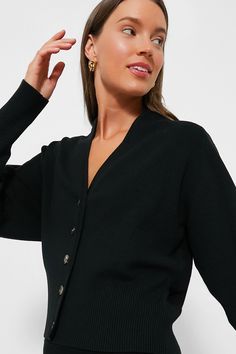 Timeless Sophistication!The Black Knit Beverly Cardigan features a classic silhouette that's not too long but not cropped either, and in a classic colorway that goes with any and everything, and updated with stylish raglan sleeves. Pair with flats and your go-to denim or with a matching Black Knit Xena Skirt for a sophisticated city-chic look.Our Favorite Details: Loose Raglan Sleeves Fitted hem Tortoise buttons Med weight fabric Body skimming fit Material: 47% Polyester, 18% Nylon, 18% Acrylic, Cocktail Attire, Plus And Minus, Current Styles, Weekend Wear, Night Looks, Classic Silhouette, City Chic, Too Long, Office Fashion