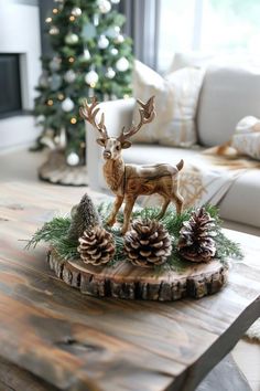 a wooden table topped with pine cones and a deer figurine sitting on top of it