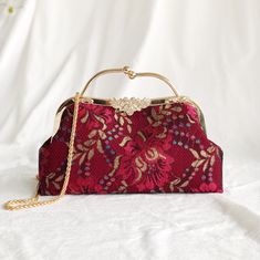 This Red Peony purse is made from a luxurious dark red Peony flower patterned lace, has both a hand clasps and long chain for convenient daily use and is great as a daily bag, or for a special occasion. **Along with the order, we will give you a free wallet made of the same fabric ：） --------------------------------- Details: Color: Dark red Peony flower pattern Fabric: Composite lace Capacity: Day to day items (phone, wallet, keys, lipstick, makeup bag etc) Function: hand held, shoulder or cros Red Clutch Evening Bag With Detachable Handle, Red Evening Clutch With Detachable Handle, Red Formal Evening Bag With Detachable Handle, Red Handheld Clutch For Formal Occasions, Elegant Burgundy Clutch Evening Bag, Elegant Burgundy Clutch For Formal Occasions, Elegant Burgundy Evening Bag, Elegant Burgundy Rectangular Evening Bag, Red Handheld Clutch For Wedding