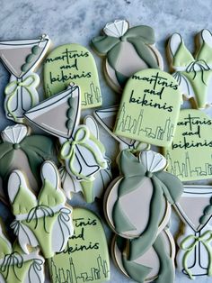 some decorated cookies with writing on them