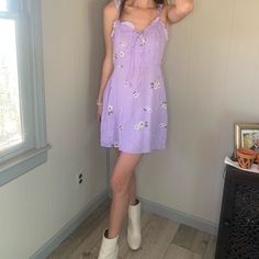 Purple Dress With White Flowers And Top Chest Tie. New With Tags Perfect Summer Or Spring Dress With Detailed Frilly Straps Super Cute For A Date Picnic With White Sneakers Casual Fitted Purple Sundress, Purple Casual Sundress For Spring, Casual Purple Sundress For Spring, Casual Purple Sundress For Brunch, Casual Purple Sundress For Daywear, Casual Purple Sundress For Day Out, Making Outfits, Purple Floral Dress, Spring Dress