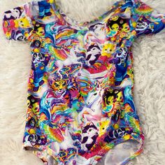 New! Wild Rich Kids Lisa Frank Leo Size 9/10 Smoke Free Home! Lisa Frank Clothes, Playful Multicolor Short Sleeve Swimwear, Multicolor Character Print Swimwear For Summer, Multicolor Swimwear With Character Print For Summer, Playful White Short Sleeve Swimwear, Playful Multicolor All Over Print Top, Multicolor Cartoon Print Swimwear For Summer, Multicolor Character Print Swimwear For Play, Fitted Multicolor Cartoon Print Swimwear