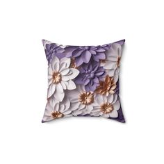 a purple and white pillow with flowers on it