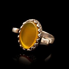 Yellow Aqeeq Silver Women Ring. Handmade in 925 sterling silver with agate stone. On the ring Oval Yellow Aqeeq - Agate stone settled. Dimensions of stone is 20 mm x 15 mm. Average weight of Yellow Aqeeq Silver Women Ring is 8 gr. (depends your ring size). Back side is open and stone touches your skin. Classic and exclusive style. Stone Type: Aqeeq - Agate Stone Color: Yellow Stone Dimensions: 20 mm x 15 mm Stone Shape: Oval Average Weight: 8 gr. Made in Istanbul, Turkey. Need 5-8 days to prepar Classic Carnelian Jewelry Hallmarked, Oval Chalcedony Fine Jewelry, Formal Yellow Gold Chalcedony Jewelry, Formal Carnelian Oval Cabochon Jewelry, Formal Jewelry With Oval Cabochon Natural Stones, Formal Oval Cabochon Carnelian Jewelry, Formal Oval Cabochon Natural Stone Jewelry, Formal Carnelian Cabochon Jewelry, Yellow Gold Oval Agate Jewelry