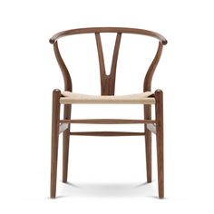 the wish chair is made from natural wood and has a woven seat pad on one side