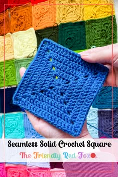 a hand holding a crochet square in front of a rainbow colored background with text that reads seamless solid crochet square the friendly red fo