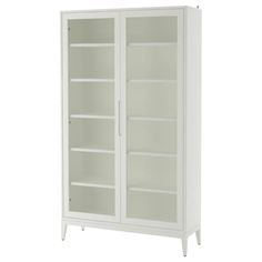 a white bookcase with glass doors on the front and bottom shelves, against a white background