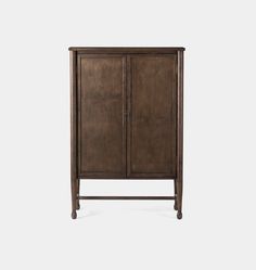 the armoire is made from wood and has two doors on both sides, one door open