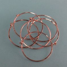 Rose gold HOOP earrings . 14k rose goldfilled hoops. hammered | Etsy Rose Gold Stackable Hoop Jewelry, Stackable Rose Gold Hoop Jewelry, Rose Gold Wire Wrapped Hoop Jewelry, Wire Wrapped Rose Gold Hoop Jewelry, Adjustable Nickel Free Rose Gold Hoop Earrings, Hammered Rose Gold Hoop Earrings Gift, Wire Creations, Gold Hoop Earring, Rose Gold Hoop Earrings