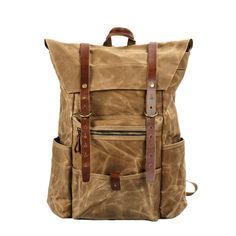 a brown backpack with leather straps and two pockets on the front, sitting against a white background