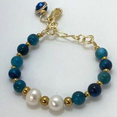 Wire Semi Precious Stone And Pearl Bracelet With Charms. Gold And Blue Apatite Jade Cc065 - Adjustable Closure - 7.5 Inches Long - 100% Handmade - Excellent Quality And Design! - Super Cute, Trendy And Brand New Boutique Item. - Wear It Alone Or Create Stacks Combinations With More Bracelets. - Ask Me Any Questions Before Purchasing. - Next Day Delivery - Shop With Confidence, What You See Is Exactly What You Get. - Exclusive. - Made In Usa. - No Pet And Smoke Free Environment - Check My Closet Semiprecious Stone Bracelet, Colorful Pearl Bracelet, Semi Precious Stone Jewelry, Blue Lace Agate Bracelet, Handmade Charm Bracelets, Bracelet With Charms, Semi Precious Stone Bracelet, Bracelets Ideas, Semiprecious Stone Jewelry