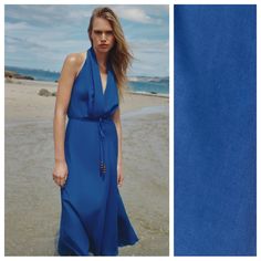 Nwt. Zara Blue Linen/Lyocell Blend Halter Neck Long Midi Dress. Surplice Neckline And Exposed Shoulders. Tied Belt In Matching Fabric. Matching Visible Topstitching Detail. Invisible Side Zip Fastening. 28% Linen 72% Lyocell. Size S. Ref. 8295/967. Pit To Pit 15,5" Flat, Waist 14", Length 54". 1032. Indigo V-neck Summer Dress, Breezy Blue V-neck Midi Dress, Indigo Maxi Dress For Spring Beach Occasion, Indigo Maxi Dress For Beach In Spring, Blue Silk Midi Dress For Spring, Indigo Maxi Dress For Beach And Spring, Spring Silk Maxi Dress In Solid Color, Indigo Maxi Dress For Summer, Indigo Sleeveless Dresses For The Beach