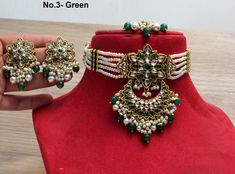 *Light Weight kundan choker necklace set. *Beautiful & Light in weight. *Pendent length- 3.5 inches( included pearl drops) *Pendent width- 1.9 inches *Earrings length: 2 inches (with drops) *Earrings diameter: 1.1 inches Bohemian Green Kundan Necklace For Diwali, Green Kundan Choker Necklace For Gifting, Green Kundan Choker For Celebration, Green Kundan Choker Necklace For Diwali, Green Chandbali Choker For Diwali, Green Heavy Chandbali Choker, Green Meenakari Choker For Celebrations, Diwali Green Chandbali Choker, Green Choker For Diwali Party