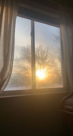 the sun is shining through the window on a cold day