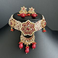 Maroon Red  Antique Polki Kundan necklace/Reverse Ad Necklace/Statement necklace/Indian/Punjabi Necklace/Pakistani Jewelry/Bridal necklace Antique Reverse Ad Stone Necklace With Mehndi Plating Regular Size And Adjustable This is 100% Handmade jewelry. So Color, shades, and texture displayed may slightly vary from the actual product due to digital image limitations. We request you to consider these minor variations. Please expect the possibility of some slight imperfections when buying handmade jewelry. If you have any questions, please message or email us. Arrives in a gift box. Please let me know if you have any questions. Thank you so much for visiting my shop.