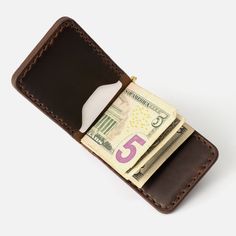 The Belford is the perfect wallet for the minimalist who still wants to be able to carry and easily access cash. The sleek design and slim profile maintain a minimalist feel and front pocket fit. Each wallet is hand-stitched and made from full-grain, Horween leather. American Flag Hat, Flag Hat, Horween Leather, Wrist Wear, Dopp Kit, The Minimalist, Minimalist Wallet, Money Clip Wallet, Custom Hats