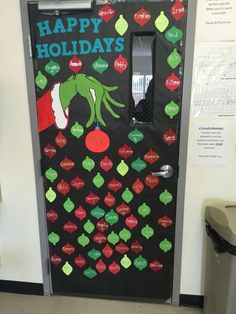 a door decorated with holiday decorations and words