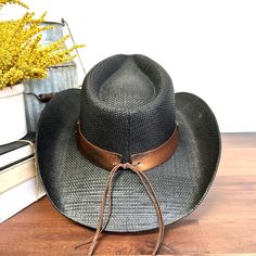 Elevate your cowboy style with the Taylor Stampede Cowboy Hat! Crafted with high-quality materials, this hat is designed to make a statement. The Taylor cowboy hat is durable, stylish, and perfect for any outdoor adventure. Stay protected from the sun while looking effortlessly stylish. OSFM (One Size Fits Most) Black Country Straw Hat For Western-themed Events, Black Country Style Straw Hat For Western-themed Events, Adjustable Black Western Sun Hat, Western Black Panama Hat With Short Brim, Black Western Panama Hat With Short Brim, Western Style Fedora Panama Hat For Outdoor, Adjustable Western Panama Hat For Outdoor, Western Style Brimmed Panama Hat For Outdoor, Black Western Sun Hat With Curved Brim