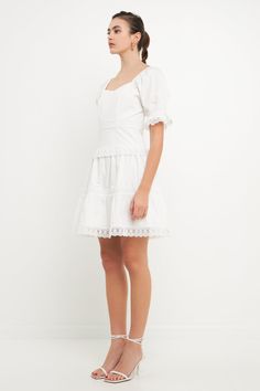 Our Sweetheart Lace Combo Puff Mini is perfect for summer picnics and other events. Made from white cotton, this mini dress has a cottage core aesthetic that will make you feel like you're one with nature. Lace combo detail Sweetheart neckline Puff short sleeves Lined Mini length Shell: 100% Cotton Lining: 80% Polyester 20% Cotton HN712D Total length: 35.25" Bust: 33.50" S WHITE: Height 5'7.5" / Bust 30" / Waist 24" / Hip 35" White Feminine Puff Sleeve Mini Dress, Feminine White Puff Sleeve Mini Dress, Feminine White Mini Puff Sleeve Dress, Cotton Mini Dress For Garden Party, White Broderie Anglaise Mini Dress For Brunch, White Puff Sleeve Mini Dress With Lace Trim, Cotton Mini Dress With Lace Trim And Square Neck, White Summer Mini Dress For Picnic, White Ruffle Hem Dress For Picnic