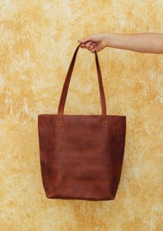 Tote-ally in love with our Classic Leather Tote 😍 Practical and in-style. Designed with a variety of convenient compartments to hold all your belongings securely. Everyday Artisan Satchel Bag, Artisan Bag For Everyday Use, Artisan Brown Everyday Bag, Artisan Brown Bag For Everyday, Large Handmade Shoulder Bag For Everyday, Artisan Rectangular Bag For Everyday, Artisan Rectangular Everyday Bag, Artisan Everyday Tote Shoulder Bag, Artisan Soft Leather Bags For Everyday Use