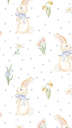 a watercolor pattern with rabbits and flowers