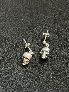 A unique handmade piece. These Skull Stud Earrings are made completely out of Sterling Silver (aka Silver 925). Fall Stud Earrings are not only for Halloween events but for any other occasion during Autumn's . Be outstanding simply by wearing our skull earrings. Make the Punk Style look even better with these tiny Punk Studs. The earrings length is 12mm and their weight 1 gram (each). The skull's length alone is 10mm and its width 0,7mm. Punk Studs, Earrings Punk, Halloween Events, Earrings Gothic, Earrings Fall, Halloween Event, Style Punk, Skull Earrings, Punk Style