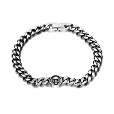 Capture his mysterious and dark side with this bold skull curb chain bracelet in sterling silver and black ion plate. Crafted in stainless steel This 10.0mm-wide design features solid curb links with cool white centres and black ion-plated edges. Polished and satin-finished details lend further contrast to the look. A sculpted skull atop the round center station completes this edgy style. The 8.5-inch bracelet secures with a fold-over clasp. Presents For Your Boyfriend, Man Crafts, Curb Chain Bracelet, Mens Bracelet Silver, Skull Bracelet, Edgy Style, Minimalist Bracelet, Bracelet For Men, Curb Chain