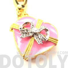 Heart Shaped Ribbon Bow Love Themed Pendant Necklace | Limited Edition | DOTOLY Pink Ribbon Jewelry Gift, Pink Ribbon Jewelry As Gift, Pink Ribbon Jewelry For Gifts, Pink Bow Jewelry Gift, Cute Pink Bow Jewelry For Gift, Cute Pink Bow Jewelry Gift, Pink Heart-shaped Jewelry For Gift Making, Valentine's Day Gift Jewelry With Pink Bow, Handmade Keychains