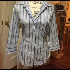 Nwot Express Size Medium Shirt , 3/4 Sleeves. Striped Shirt. 77% Cotton, 20% Nylon, 3% Spandex. Button Down Shirt. Blue Stretch Collared Blouse, Fitted Half Sleeve Tops With Buttons, Spring Office Shirt With 3/4 Sleeves, Fitted Half Sleeve Shirt With Button Closure, Blue Half Sleeve Blouse With Buttons, Blue Fitted Half-sleeve Blouse, Office Shirt With 3/4 Sleeves In Cotton, Cotton 3/4 Sleeve Office Shirt, Office Cotton Shirt With 3/4 Sleeves