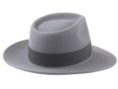 The Laird: Wide Brim Fedora for the Modern Gentleman Key Features - Exclusive Teardrop Crown design- Tried and true handmade quality- Hand crafted to your exact head measurement- Available in any color combination- Delivered safely inside a hat box- Free organic cotton drawstring bag- Comes with care instructions Product Details - Dress weight Rabbit fur felt hat body- Smooth surface finish- 4 1/2" crown height- 3" raw-edge fedora snap brim- 1 1/2" grosgrain ribbon hatband- Viscose satin lining- Gambler Hat, Large Hats