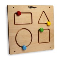 a wooden toy with shapes and knobs on the front, including an o - ring