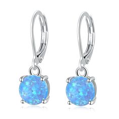 PRICES MAY VARY. ♥ This leverback earrings is inlaid with created blue fire opal for a unique look. The Good Quality earrings has a high polish finish. The earrings Length is 1", Width: 8mm, Total Weight : 1.75g(1 Pair Earrings).GEM stone is Blue Fire Opal 8mm ♥ Gemstones Classic Leverback Earrings,Nice and secure easy-hoop clasp for safety.Not easy to fall off and stay closed.the stunning blue colors in this stone makes it a perfect fashion earrings.You will love this vintage style drop earring Gem Drop Earrings, Blue Fire Opal, Gemstone Drop Earrings, Synthetic Opal, Discount Jewelry, Leverback Earrings, Silver Plated Jewelry, Blue Fire, Pretty Earrings