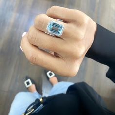 Fantastic 11.81 Carat Big Blue Topaz Fancy Light Blue Color Ring 14K White Gold , Emerlad Shape Blue Topaz ring Engagement Ring With Diamond Halo Details: ⟡ One ring. ⟡ Ring is made of 14K White Gold. ⟡ You will receive a gemologists IGL & HRD certificate ⟡ Packaged in a luxury Amberjack jewelry box. ⟡ This item discreetly stamped with a gold karat stamp. ⟡ Handmade item designed, cut and created by Amberjack Jewelry. ⟡ Made to order - please allow for up to 14 business days production time. Gia Certified Blue Topaz Ring With Diamond, Gia Certified Blue Topaz Diamond Ring, Light Blue Diamond Ring With Gemstone, Light Blue Diamond Rings With Gemstone, Light Blue Diamond Ring, Blue Aquamarine Diamond Ring, Gia Certified Topaz Ring For Promise, Fine Jewelry, Light Blue Diamond Ring In Fine Jewelry Style, Light Blue Aquamarine Rings With Halo Setting