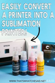 the printer is next to some ink bottles and a box with an ad on it